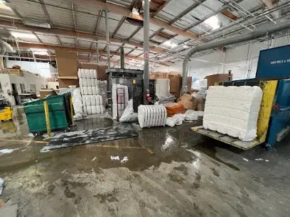 Flooded warehouse floor during commercial water cleanup in South Gate