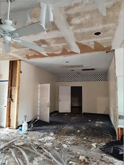 Collapsed wet ceiling after a roof leak in a South Gate home